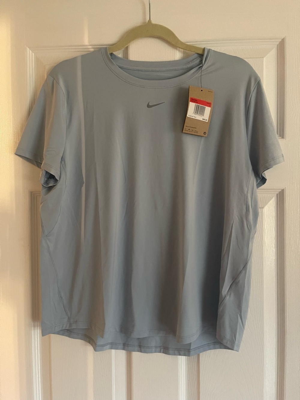 Nike women’s  Light dusty Blue Short Sleeve Dri-FIT Training Tee